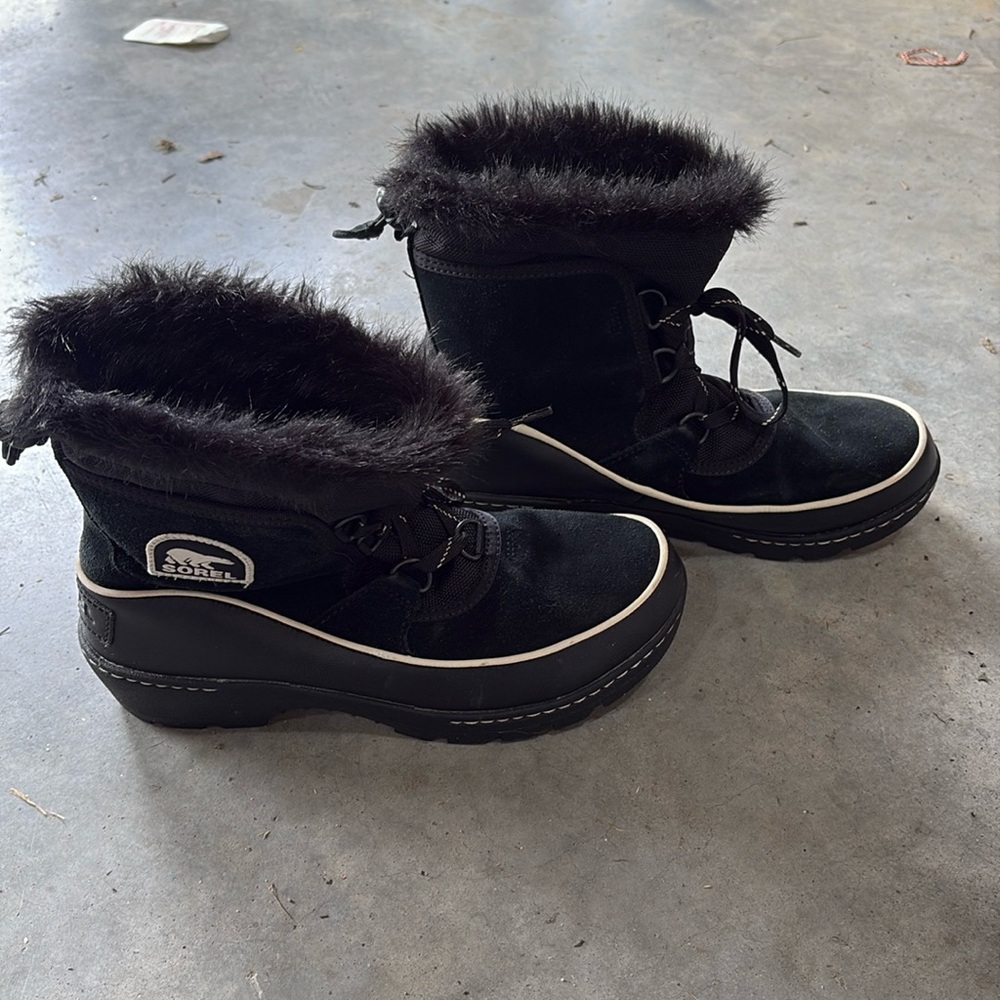 Sorel waterproof snow boots.